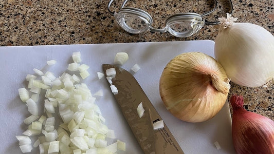 Onion-goggles-cutting-board-knife-diced-onions